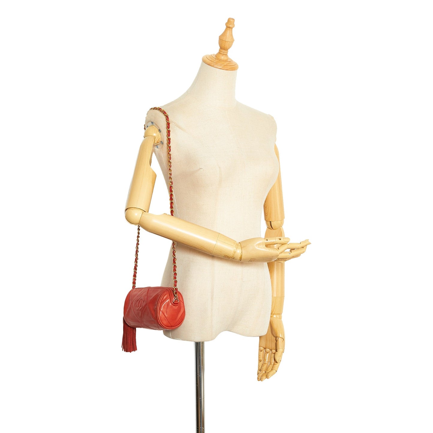 Chanel sac à bandoulière rond rouge matelassé à franges et pompons