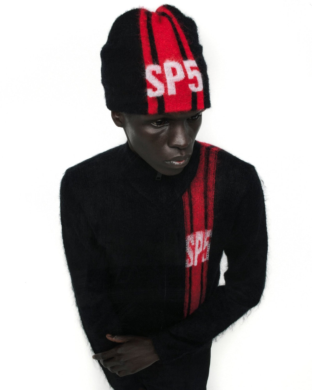 RALLY KNIT ZIP SWEATER